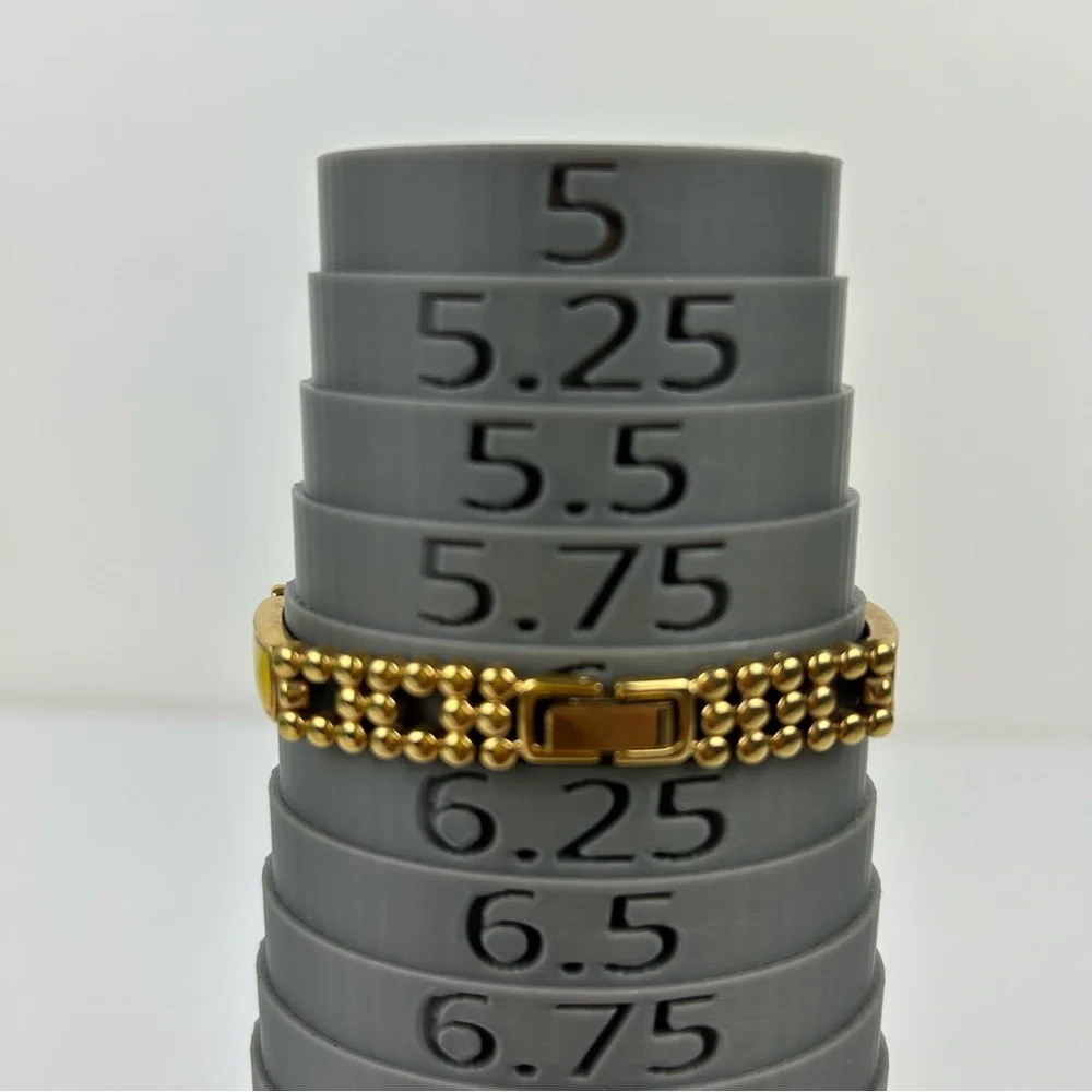 Elegant Avon Gold Tone Watch with Yellow Accents, 1